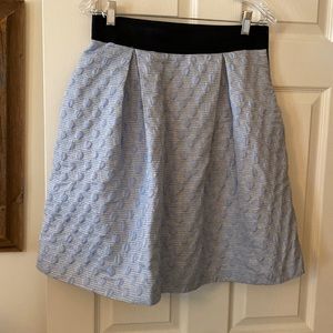 Blue skirt with dot embellishment in fabric from boutique in Capri, 
Italy